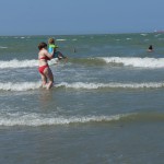 Enjoying the waves with Maman