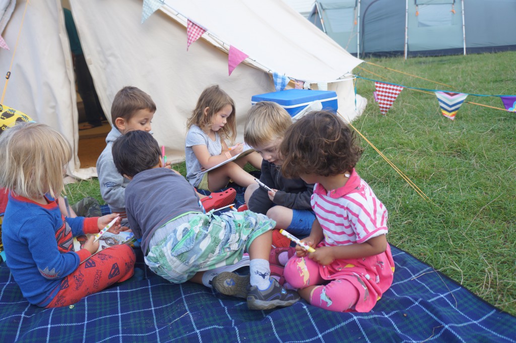 Playing in front of our tents