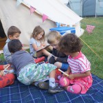 Playing in front of our tents